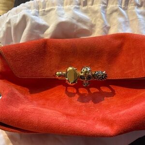 Alexander McQueen Suede Clutch with Gold Skull Detail